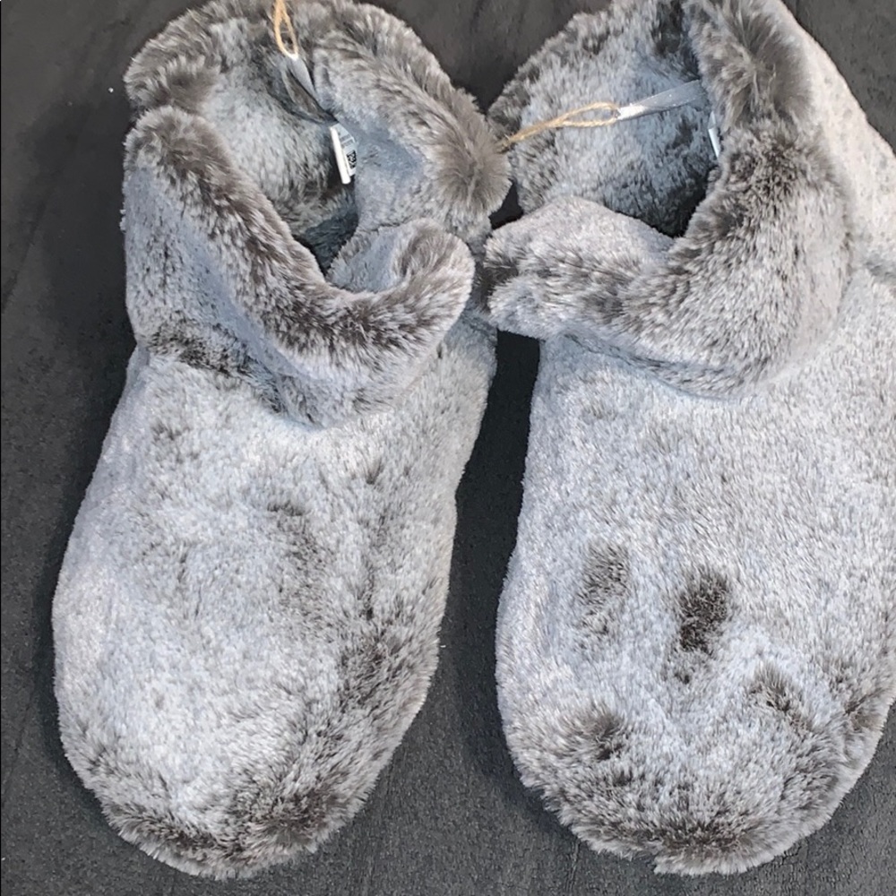 Never worn before grey fuzzy house shoes!